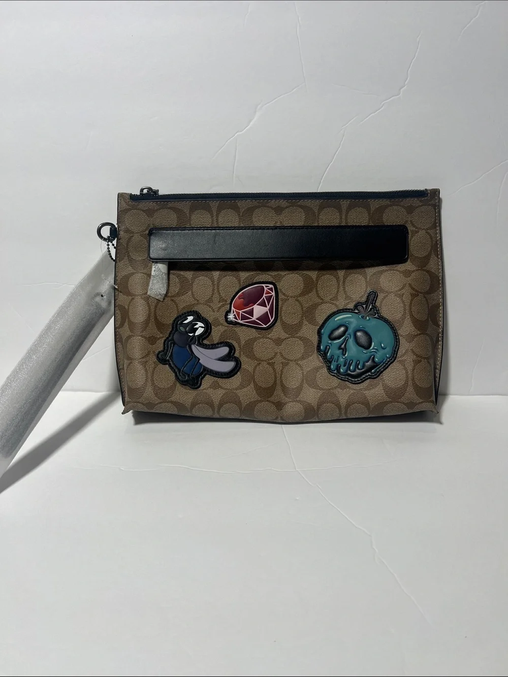 Coach Brown Monogram Wristlet with Enamel Patches